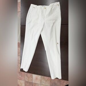 One pair of size two women dress pants

• new with tag
• stain on left side